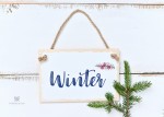 Tabliczka z napisem Winter do sesji świątecznych